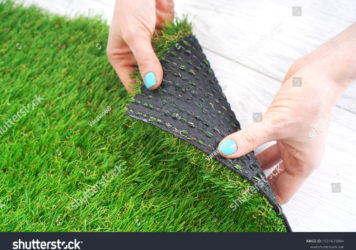 https://flooringjunction.com.au/wp-content/uploads/2022/10/stock-photo-female-hands-holding-a-green-artificial-turf-roll-1931631884-356x250.jpg